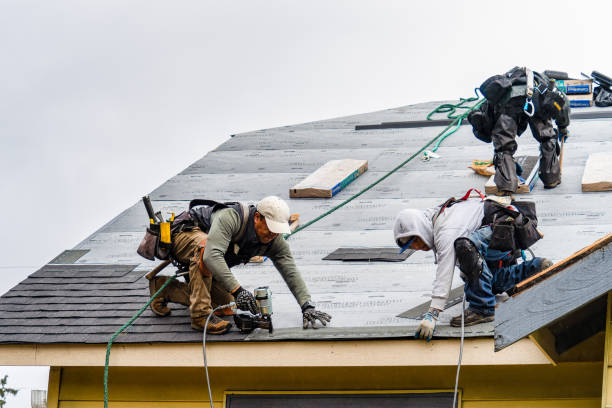 Professional Roof Replacement technician working in Deedsville, IN